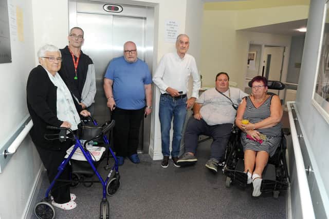 From left, residents who rely on the lift - Ivy Turnbull, 79, Neil Mundy, 50, John McGowan, 65, Bill Prior, 74, Dave Wade, 55, and Lyn Prior, 62
Picture: Sarah Standing (180769-6286)