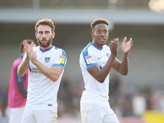 Pompey's Ben Close and Jamal Lowe after their game at Wimbledon
