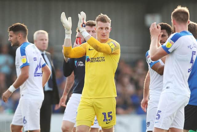 The Pompey players applaud the Blues' fans at the final whistle Picture: Joe Pepler