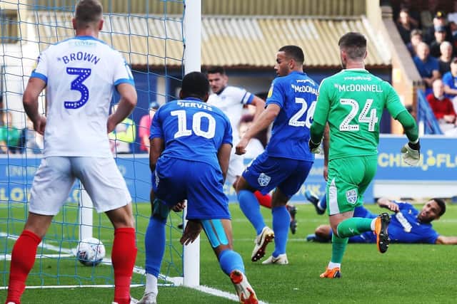 Gareth Evans scores for Pompey. Picture: Joe Pepler