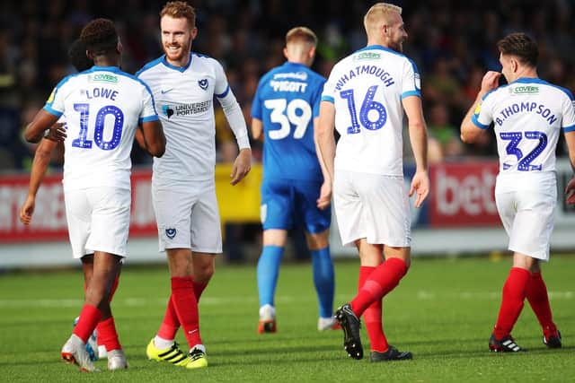 Tom Naylor celebrates his opening goal at AFC Wimbledon with Jamal Lowe. Picture: Joe Pepler