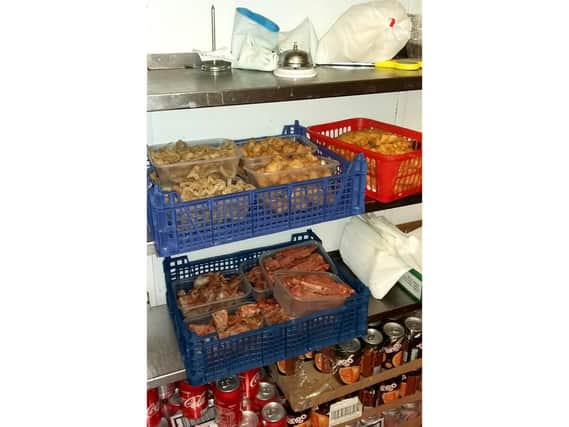 Meat stored in open boxes at the Golden Boat takeaway in Cosham Picture: Portsmouth City Council