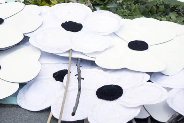 St John Ambulance volunteers will be able to wear white poppies this year