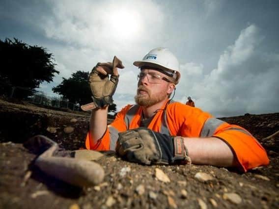 Henry Callender inspects some of the findings. Picture: Southern Water