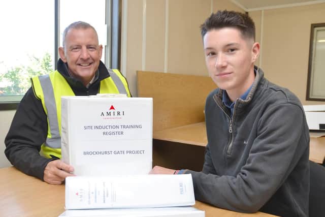 (from Left) Amiris Mark Vincent discusses the facets of site management with Dan Warren.