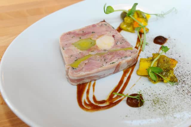 Ham hock and rabbit terrine, roast apple puree and piccalilli.
Picture: Sarah Standing (180639-2917)