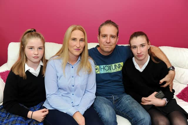 Jackie Chandler with her husband Gary Sprake and their daughters Rosa-May, left, and Ella-May, right. Picture: Sarah Standing