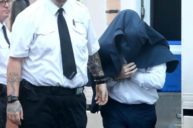 Craig Savage is led into Lewes Crown Court, where he is on trial accused of murdering his ex-wife Michelle Savage and her mother Heather Whitbread in Bexhill Road, St Leonards, East Sussex. Picture: Gareth Fuller/PA Wire