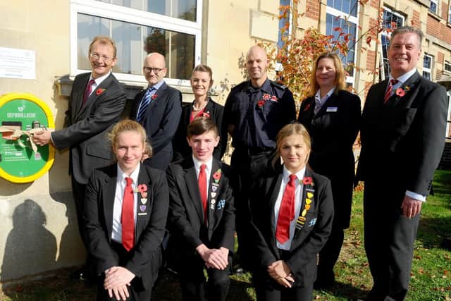 As part of their Restart a Heart Day, Mayfield School in Portsmouth unveiled a defibrillator. Picture: Sarah Standing (180778-6679)