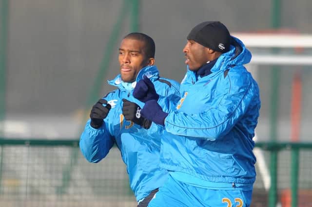Sylvain Distin and Sol Campbell.