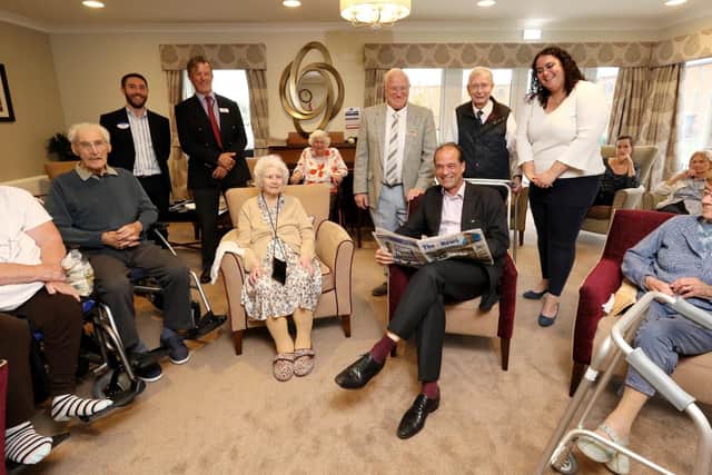 Local MP George Hollingbery keeps residents up to speed on current affairs with a copy of The News.