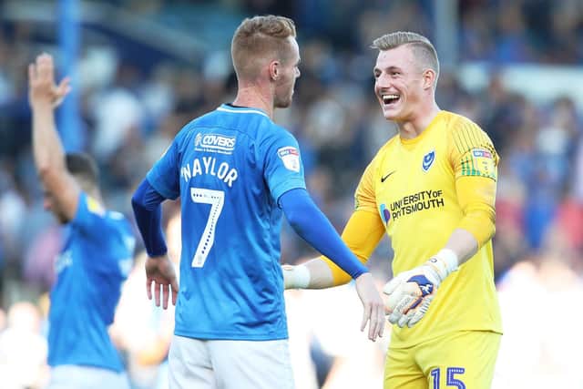 Craig MacGillivray celebrates Fratton Park victory over Plymouth in September. Picture: Joe Pepler