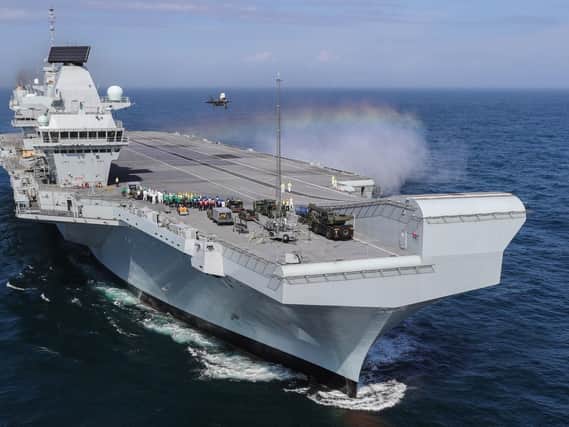 HMS Queen Elizabeth could be getting a dry dock for major refits in Portsmouth under new plans being looked at by the Royal Navy. Picture: Kyle Heller/Royal Navy/MoD/Crown copyright/PA Wire