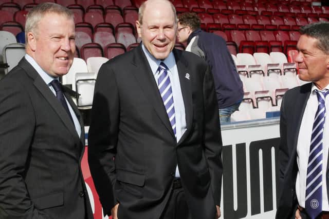 Pompey owner Michael Eisner, centre, with manager Kenny Jackett and chief executive Mark Catlin at AFC Wimbledon. Picture: Joe Pepler
