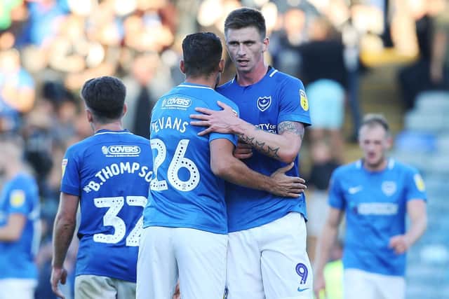 Goalscorer Oli Hawkins with Gareth Evans at the final whistle Picture: Joe Pepler