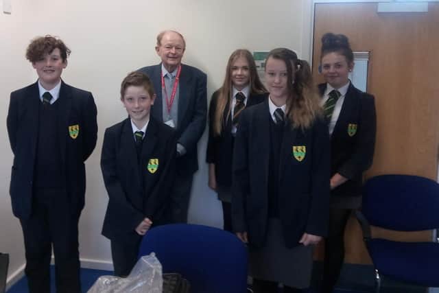 Colin Chambers surrounded by (l to r front) Kai O'Connor, 12, William Smith, 12, Mary Jane, 13. Back (l to r) Coral Harland, 13 and Ruby St John, 13.