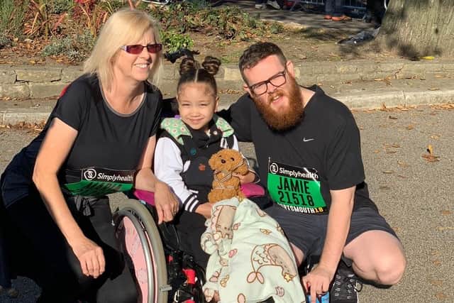 Malaya with fundraisers Maria and Jamie