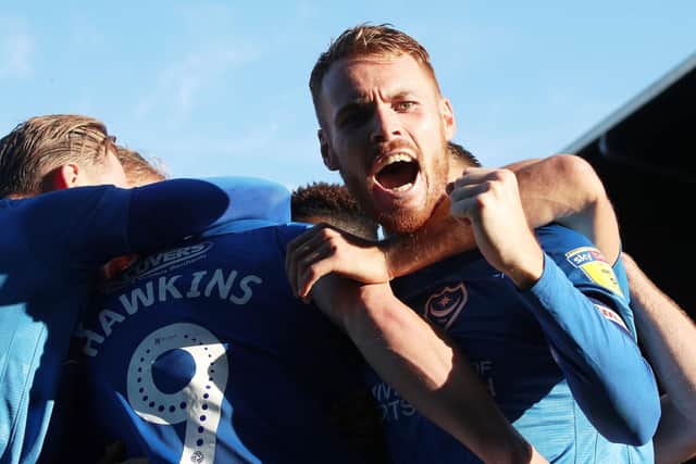 Pompey celebrate the Fleetwood winner from Oli Hawkins. Picture: Joe Pepler
