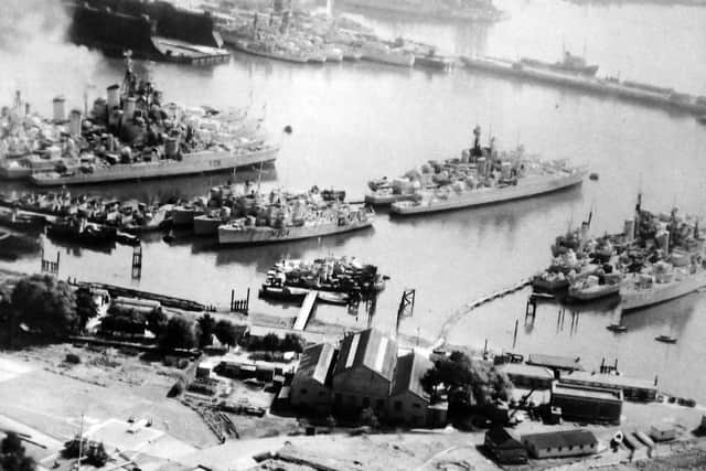Part of the Royal Navys reserve fleet parked off Whale Island in 1957.