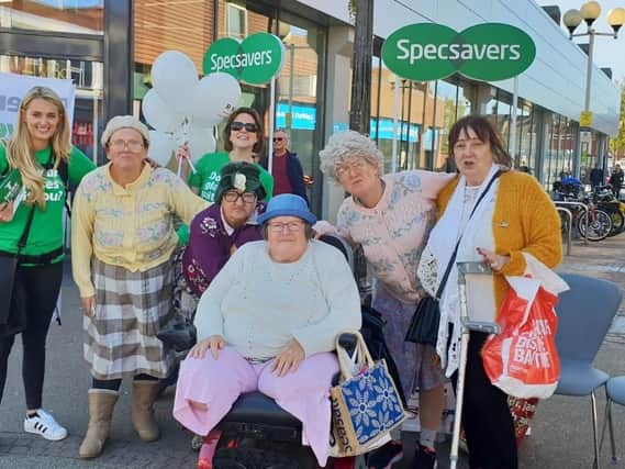 Emily Guest, PR Specsavers, area manager Ali Harris, with the dancing grannies and two Specsavers customers