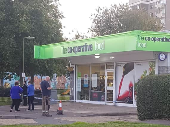 Co-op on St Albans Road, Havant, taped off by police following a robbery