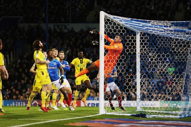 Burton keeper Dimitar Evtimov keeps Pompey at bay in tonight's 2-2 draw. Picture: Joe Pepler