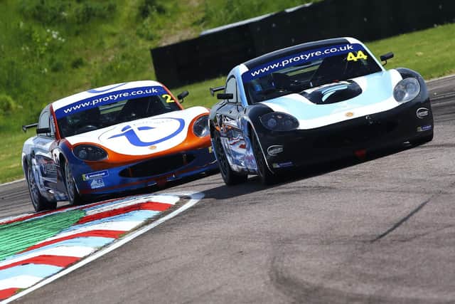 Racing driver Max Bird in action