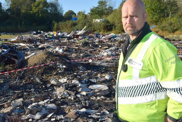 Nigel Oliver, criminal investigator for the Environment Agency at a Havant site which has been used as a fly-tip by several firms acting illegally. Picture: Tom Cotterill
