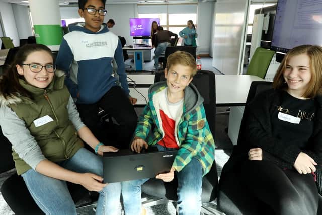 From left, Emily Miles, 11, Roser Rahman, 13, Finn Brook-Holmes, 11, and Isabella McGowan, 11, take part in the CyberFirst Adventurers event.