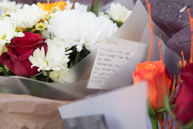 Floral tributes outside The Eagle pub Picture:Steve Reid