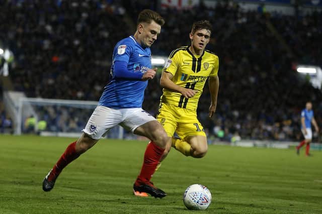 Ben Thompson launches a Pompey attack against Burton on Tuesday night. Picture: Joe Pepler