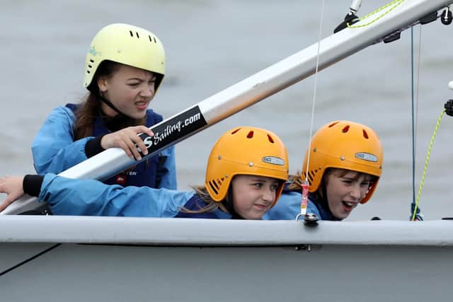 From left, Jessica Shillingford, Clara Scott-Joynt and Lili Sharpe, all 11. Children from Priory School, Southsea, take part in the Sailwise Project at the Andrew Simpson Watersports Centre Picture: Chris Moorhouse