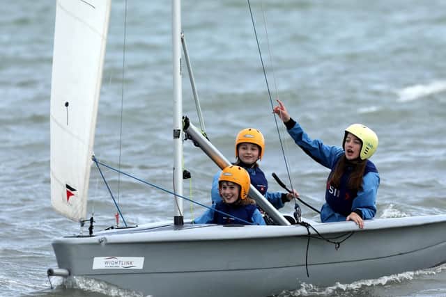From left, Lili Sharpe, Clara Scott-Joynt and Jessica Shillingford, all 11. Children from Priory School, Southsea, take part in the Sailwise Project at the Andrew Simpson Watersports Centre.