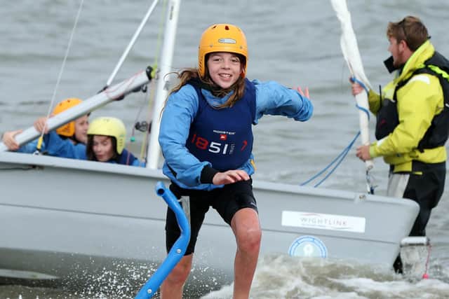 Coming ashore. Children from Priory School, Southsea, take part in the Sailwise Project at the Andrew Simpson Watersports Centre Picture: Chris Moorhouse