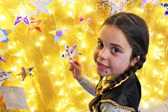 Youngsters walk through Portsmouth Historic Dockyard for the Starlit walk.