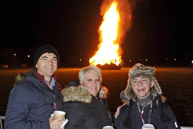 The 2018 HMS Sultan bonfire and firework display (l to r), Keith and Karen Weller and their son Harry (15).
Picture Ian Hargreaves  (181025-1_sultan)