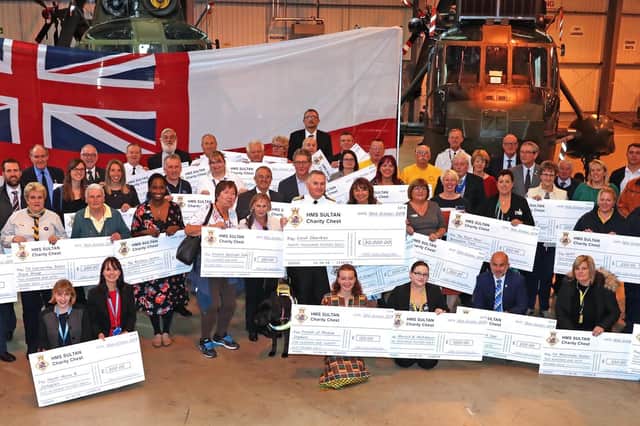 Recipients of funds from the HMS Sultan Charity Chest. Picture: Leading Photographer Rory Arnold