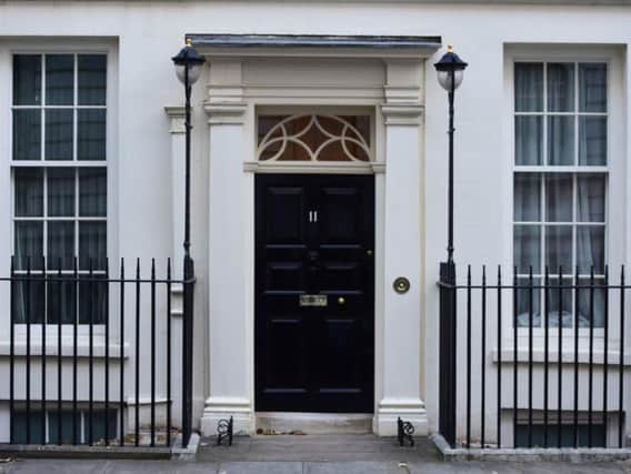 The closed door of number 11 Downing Street, London, the official residence of the Chancellor of the Exchequor, ahead of Chancellor Philip Hammond delivering his Budget to the House of Commons this afternoon. Picture: David Mirzoeff/PA Wire
