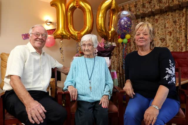 Lillian Hurley celebrates her 100th birthday with her son and daughter, John Hurley and Sandra Maker.
