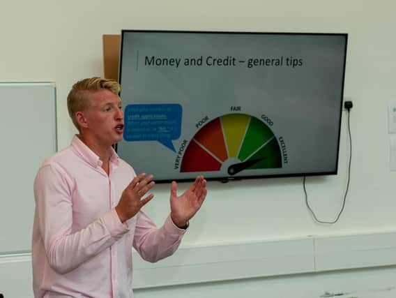 Entrepreneur Alfie Ruffell is creating an app to help people manage their finances and is teaching young people about dealing with debt Picture: Vernon Nash (180418-004)