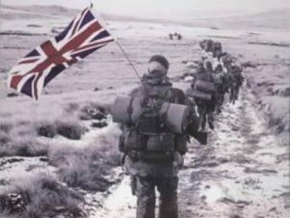 Troops march through the Falklands