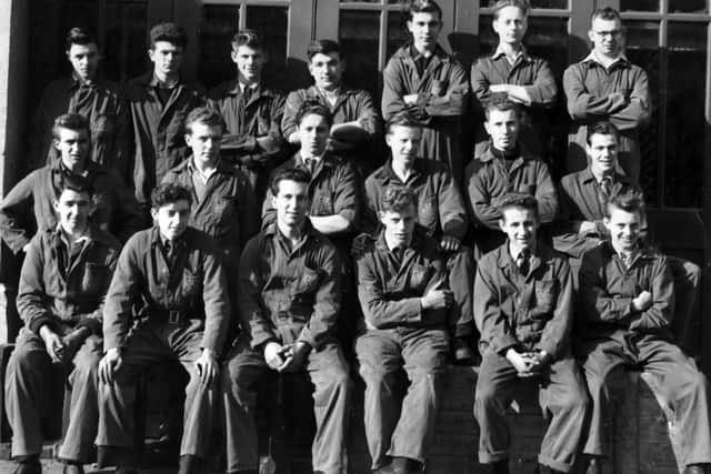 Mike and the mechanics... pictured with his fellow apprentices at Gordon Motors, Cosham, is Mike Simpson, third from the left in the front row.