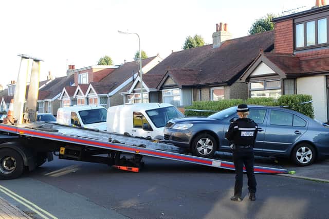A Skoda is removed from the driveway at a detached home in Southcroft Road, Gosport, which has become the centre of a murder investigation after a 54-year-old man died on Monday. Picture: Sarah Standing.