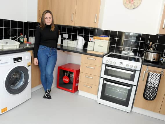 Holly Williams with her new kitchen appliances, bought from Argos after a lengthy battle with Currys