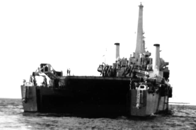 Doug Wills' photograph taken from the landing craft as he approached HMS Intrepid.