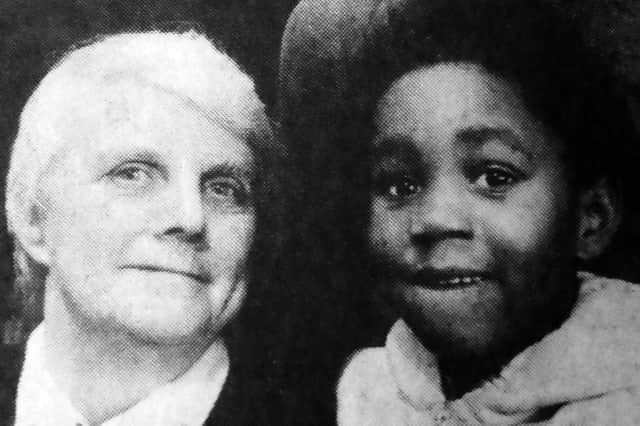 Edith Bowers with one of her foster children Dayo.
