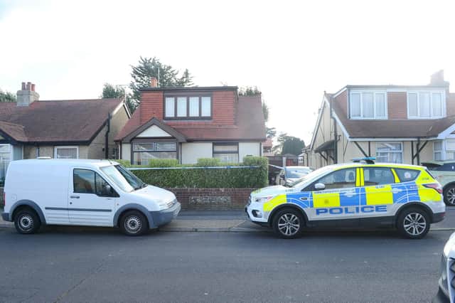 Police outside the house in Southcroft Road on Tuesday