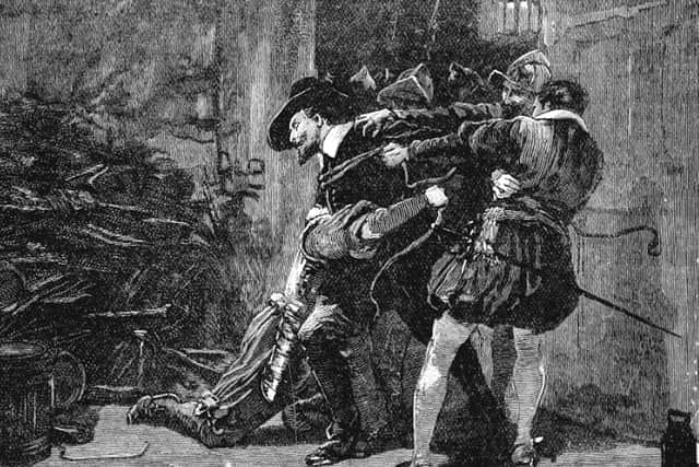 Guy Fawkes is arrested at the Houses of Parliament.