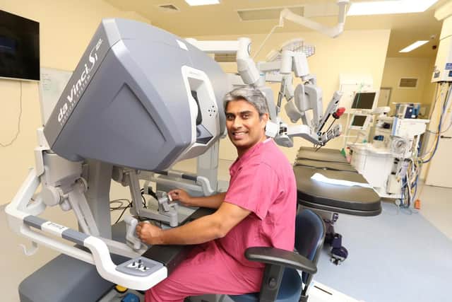 Consultant surgeon Jim Khan with the Da Vinci robot. Picture: Habibur Rahman