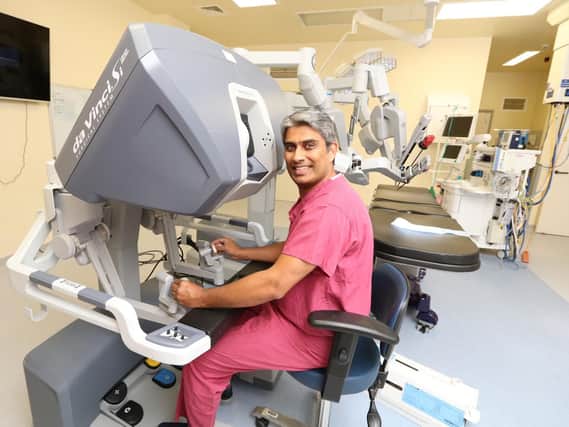 Consultant surgeon Jim Khan with the Da Vinci robot. Picture: Habibur Rahman